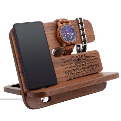 China Custom Engraved Wooden Mobile Docking Station Men's Filling Gift Walnut Cell Phone Stand Watch Holder Wooden Dock Organizer Base for sale