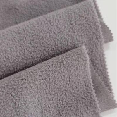 China Hot Sale High Quality Cheap Knitted 100% Plain Polyester Fleece P/D Fabric 125GSM Brush Tear-Resistant Fabric For Coats for sale