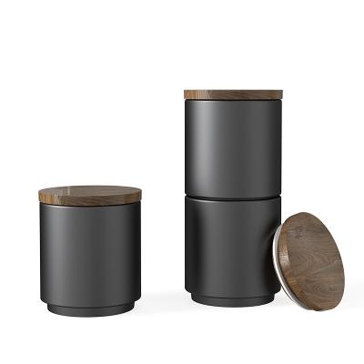 China Sturdy and Durable DHPO 300ml mini wholesale eco-friendly kitchen tea sugar coffee high temperature co-fired ceramics canisters with wooden lid for sale