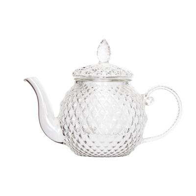 China Sustainable Flower Tea Heat Resistant Pyrex Glass Teapot With Infuser for sale