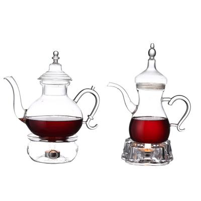 China Contemporary Borosilicate Glass Flower Psyche Teapot Are Popular In Arabia With Base for sale