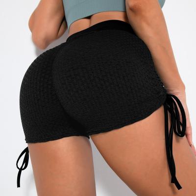 China 2021 Breathable Drawstring Pattern Cavity Yoga Pants High Waist Hip Fitness Shorts Leggings Women for sale