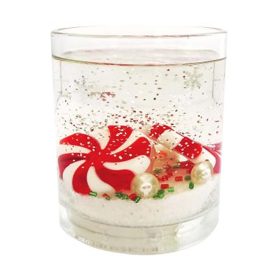 China Battery Operated Wholesale Glass Jar Filled Clear Gel Candy Ornaments Battery Operated LED Scented Candle For Christmas for sale