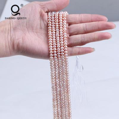 China Daking Freshwater Pearl Decoration Fashion Jewelry AAA 4-5mm Button White Freshwater Pearl Strand for sale