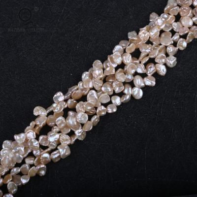 China Natural Freshwater Pearl AA 7-8mm Pink Irregular Flower Shape Keshi Freshwater Pearl Strands Price for sale