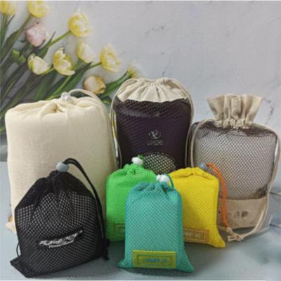 China Durable Colorful Recyclable Christmas Polyester Fabric Gift Mesh Packing Bag Mesh Gift No Woven Bag for sale