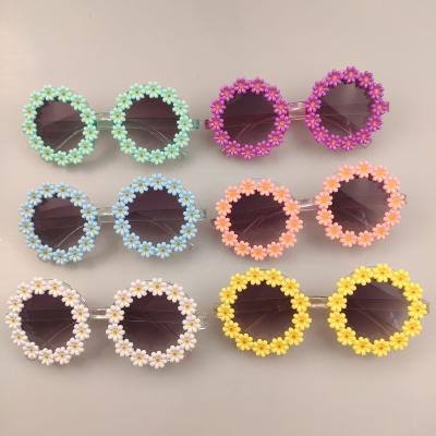 China Fashion Sunglasses Designer Cute Round Flower UV400 Shaped Sun Glass Frame Plastic Children Sun Glasses For Girls 2022 for sale