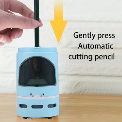 China New Semester Children's Electric Pencil Sharpener School Desk Comes With Portable Mini Desktop Vacuum Cleaner for sale