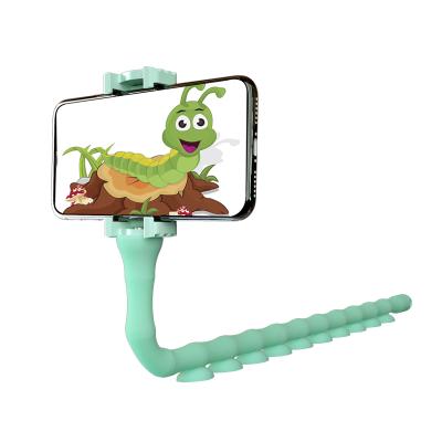 China 2019 newcomer newcomer worm shape silicone mobile phone stand adjustable cute multifunctional portable phone pod strong sucking position for sale