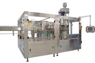 China 200ml - 2L Automatic Bottle Filling Machine , PET Bottle Carbonated Drinks Filling Line for sale