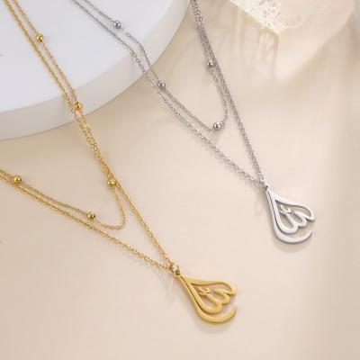 China Europe and America 2023 Trendy Shinny drop necklace gold pearl double layer chain necklace laser stainless steel necklaces for woman for sale