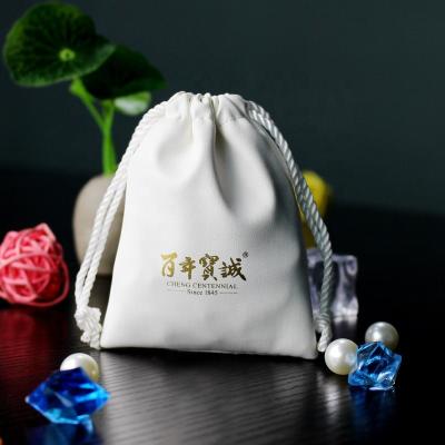 China Custom Logo Printed Luxury Leather Gift Bags PU Jewelry Packaging Pouches for sale