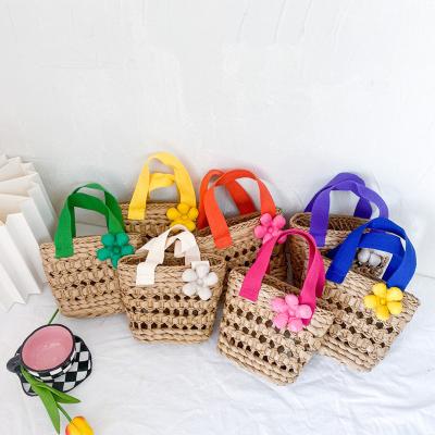 China Cute Fashion Late Summer Straw Beach Bag with Purses and Mini Flower Girls Designer Straw Basket Bag Kids Handbag for sale