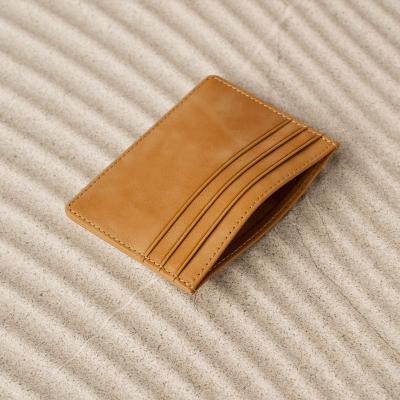 China Fashion Minimalist Ultra Thin Men's Travel Credit Rfid Genuine Leather Wallet Slim Leather Card Holder for sale