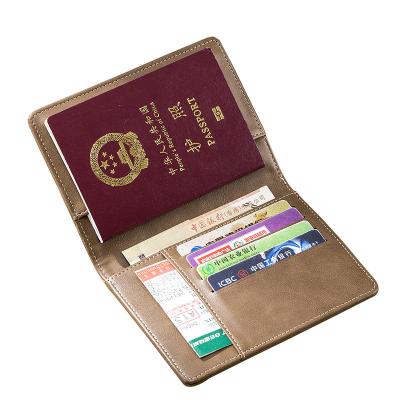 China Custom Retro RFID Blocking PU Leather Passport Cover Travel Passport Wallet Card Holder Case For Car Dcouments for sale