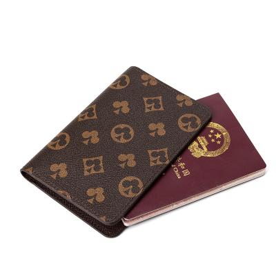 China Custom Retro Logo Passport Card Holder PU Leather Wholesale Leather Passport Cover for sale