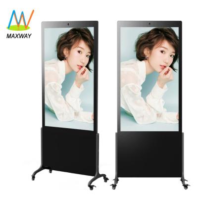 China 65 Inch Big Screen Indoor Advertising Machine Android Wifi Rolls Floor Stand Digital Signage LCD Kiosk for sale