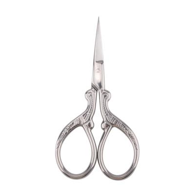 China Hot selling embossed stainless steel nose hair scissors forehead scissors right handed scissors with color handles for sale