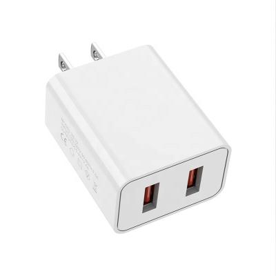 China Dual USB Ports Hot Selling Universal Travel Charger Charging Adapter,Portable 10W Wall Adapter USB Charger Block In Cube Fast Travel Charger For Phone for sale