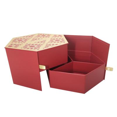 China Recycled Materials Creative Hexagon Shaped Magnetic Macaron Gift Boxes With Ribbon Paper Gift Box Packaging for sale