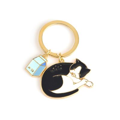 China Promotion Gift QIHE New Design Cast Enamel Zinc Alloy Black White Soft Cat Custom Key Chain for sale