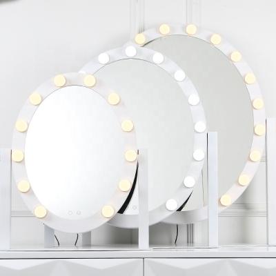 China Modern Oval Smart Makeup Table Makeup Mirror Touch Sensor Dimmable LED Dressing Table LED Cosmetic Mirror Table Light for sale