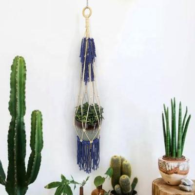 China Single Plant Hangers Macrame Wall Hanging Planters Handmade Indoor Plant Stand for sale