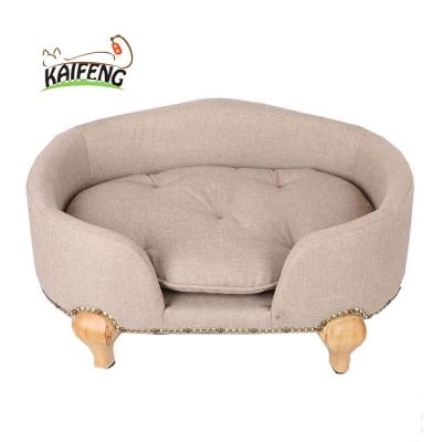 China Kaifeng Cute Wooden Plush Dog Sleeping Beds Pet Sofa With Four Wooden Legs And Comfy Cushion for sale