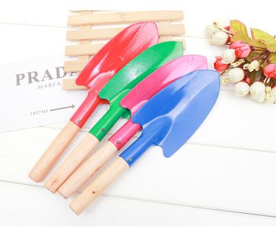 China Garden Shovel Colorful Wholesale Wooden Handle Quality Stainless Garden Tools for sale