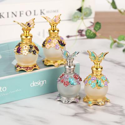 China Luxury Diamond-studded Personal Care Dubai Butterfly Perfume Bottle 15ML Essential Oil Net Red Ball Bottle Customized for sale