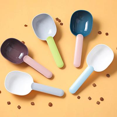 China Multifunctional Pet Dog Food Stored Feeding Spoon Spoon With Sealed Bag Clip Measuring Cup Creative Curved Design, Easy To Clean for sale