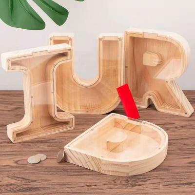 China Children's Toy Wooden Piggy Bank Personalized Money Saving Box Cash Box DIY Letter Shaped Educational Wooden Piggy Bank for sale