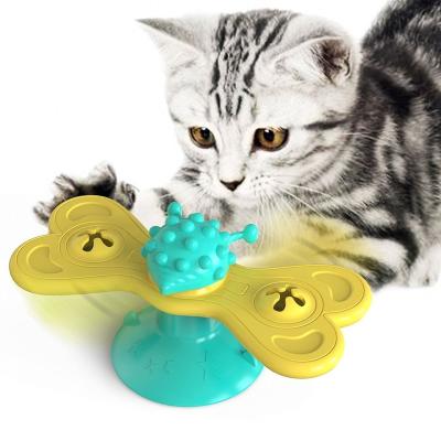 China Sustainable Hot Selling Tpr Eco-friendly Plastic Spinning Windmill Cat Pet Teeth Cleaning Chewer Toy Butterfly Ball for sale