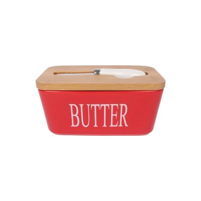 China Custom Microwavable Rectangle Ceramic Butter Keeper Dish Container with Cover Lids and Butter Knife for sale