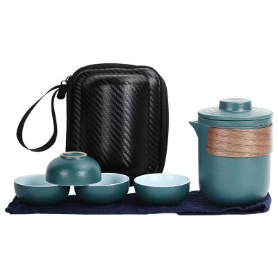 China Viable Mini Portable Travel Ceramic Kungfu Tea Set with 1 Teapot and 4 Cups for Home Office for sale