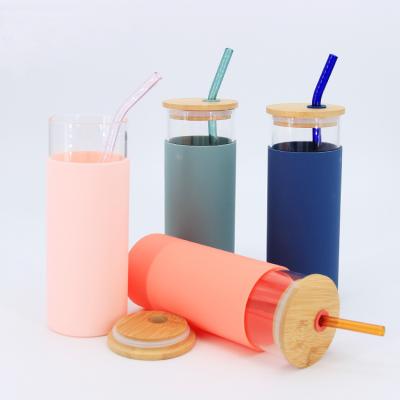 China Sustainable Wholesale Custom Logo Water Tea Glass Cup With Llid Straw And Silicon Bamboo Sleeve for sale