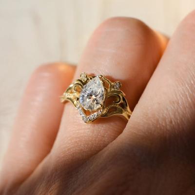 China Vintage Vintage Jewelry Moissanite 10k Gold Ring 7*5mm Pear Women Engagement Moissanite Ring for sale