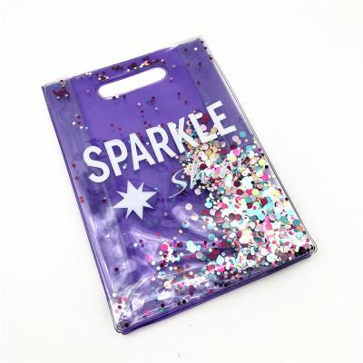 China Fashion Sparkle Travel Makeup Bag Durable Cute Clear Waterproof Purple PVC Cosmetic Pouch With Glitters for sale