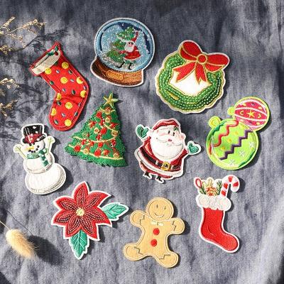 China Sustainable Custom Sew On Patches Embroidered Christmas Santa Baby Chenille Embroidery Iron On Patches for sale