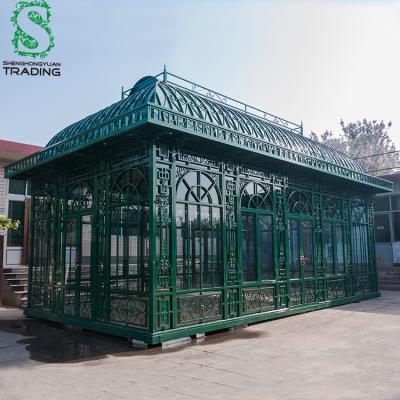 China Europe Wrought Iron Steel Garden House With Tempered Glass for sale