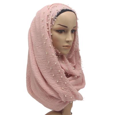 China Comfortable soft plain cotton solid color pashmina beaded pleat cotton hijab with beads for sale