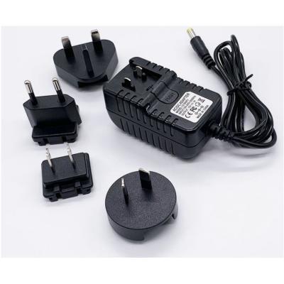 China 9V 1A EU UK USA AU power adapter / 12V 1.25A interchangeable plug power adapter / convertible plug power adapter 12V 0.6A Tary-E12W for sale