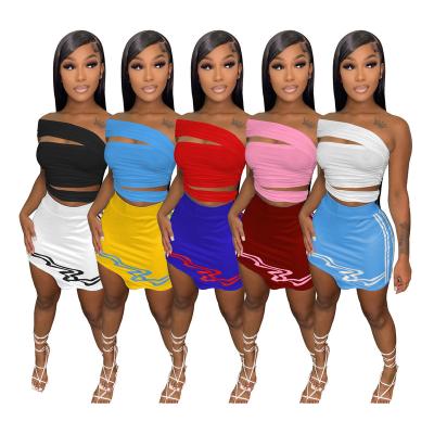 China Bestselling QUICK DRY Women's Sets Sexy Club Hollow One Shoulder Skirt Two Piece Set 2 Piece Skirt Set for sale