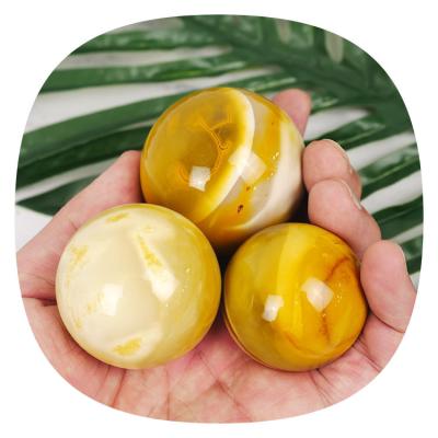 China Europe real donghai egg natural quartz stone cuarzoss yellow wholesale bulk crystal open healing crystal balls spheres for sale