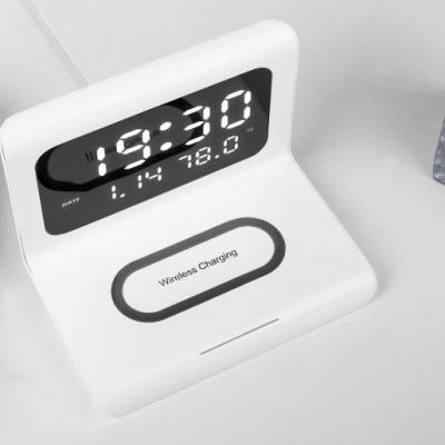 China Mobile Phone Led Display Alarm Clock Wireless Charger With Temperature And Date for sale