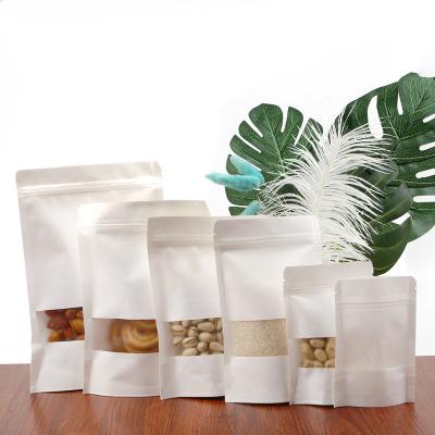 China 100pcs White Food Craft Paper Bags Zip Lock With Window Stand Up Bulk Pouches Resealable Packing Bags For Tea Coffee Bean Candy for sale