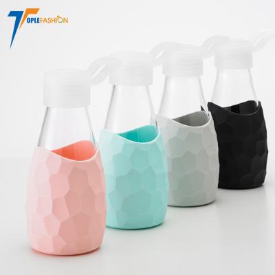 China BPA Free Borosilicate Silicone Sustainable Leakproof Wholesale Sleeve Sports Glass Drinking Water Bottle With Lid for sale