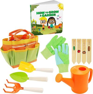 China Gardening/Beach Playing Kids Garden Tool Kit Toy Includes Watering Can Rake Shovel Wholesale Trowel With Garden Storybook for sale