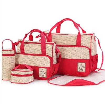 China 100% Eco-friendly Multifunctional 5pcs Set Mom Baby Diaper Bags With Changing Pad for sale