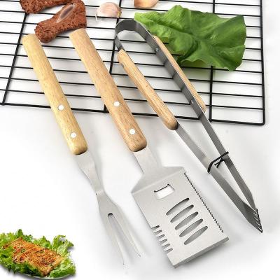 China BBQ Tool Kit 3pcs Easily Cleaned Wooden Stainless Steel Handle Barbecue Grill With Oxford Bag for sale